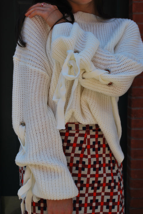Cream knit lace up sweater