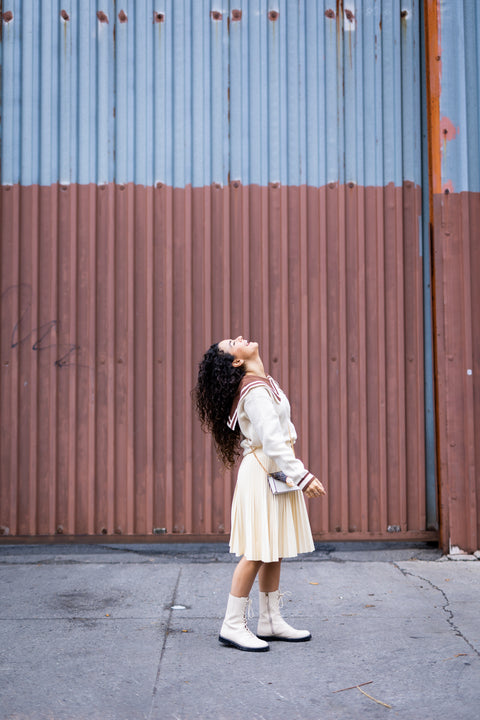 PARIS PLEAT SKIRT IN CREAM