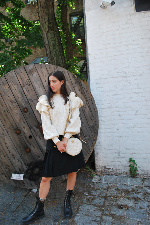 Cream cableknit ruffled sweater