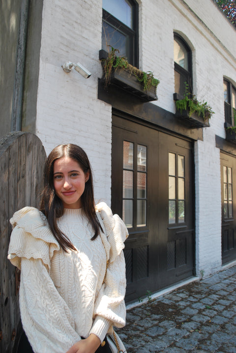 Cream cableknit ruffled sweater