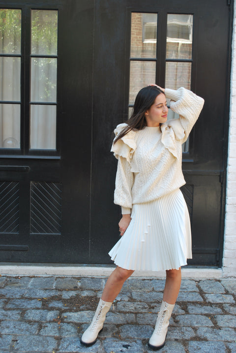 Cream cableknit ruffled sweater