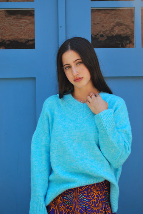 Bright blue v knit sweater