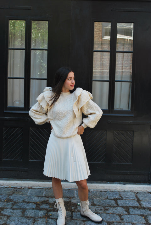 Cream cableknit ruffled sweater