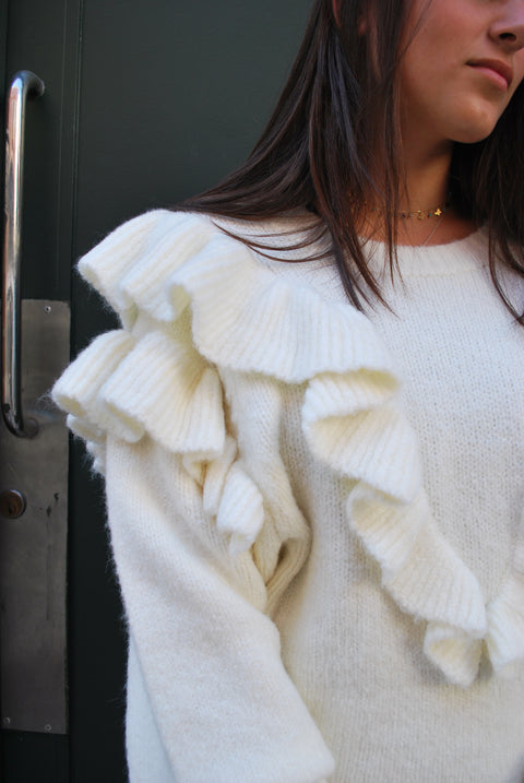 Ruffled knit cream sweater